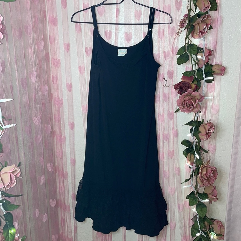Black slip dress with ruffles